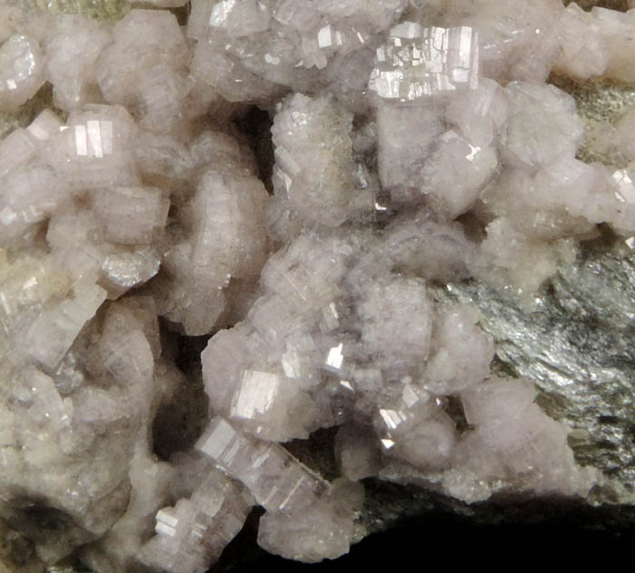 Fluorapatite on Muscovite from Emmons Quarry, southeastern slope of Uncle Tom Mountain, Greenwood, Oxford County, Maine