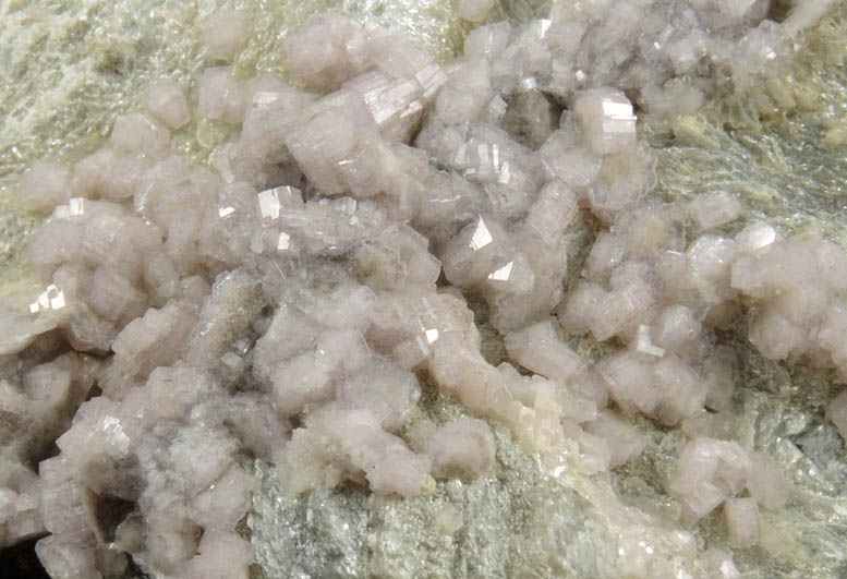 Fluorapatite on Muscovite from Emmons Quarry, southeastern slope of Uncle Tom Mountain, Greenwood, Oxford County, Maine