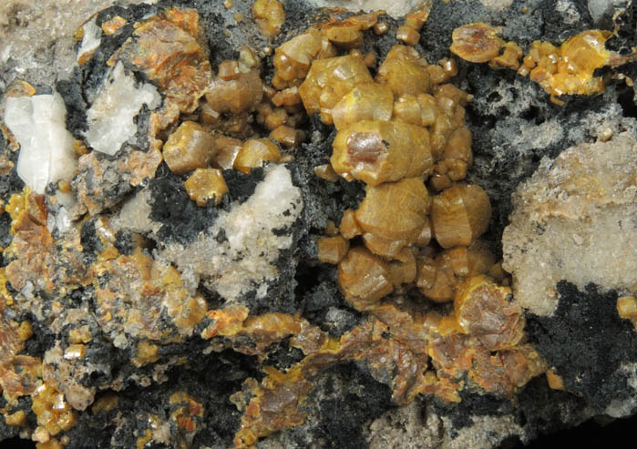 Mimetite var. Campylite with Psilomelane and Quartz from Drygill Mine, Caldbeck Fells, Cumberland, England