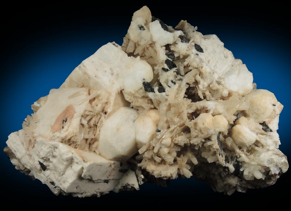 Analcime, Natrolite, Aegirine, Serandite, Microcline Rhodochrosite, Polylithionite from Poudrette Quarry, Mont Saint-Hilaire, Québec, Canada