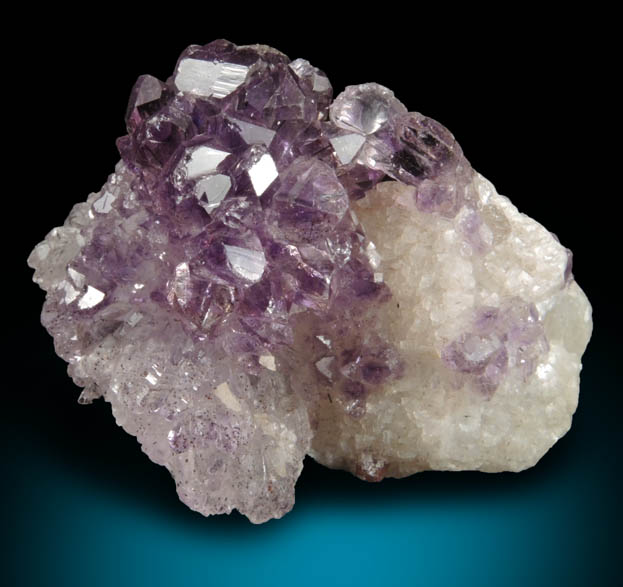 Quartz var. Amethyst Quartz with Goethite inclusions on Calcite from Kakamunurle Mine, Karur, Tamil Nadu, India