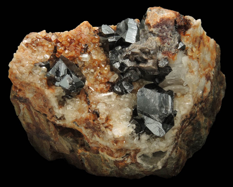 Cassiterite (twinned crystals) on Topaz from St. Agnes District, Cornwall, England