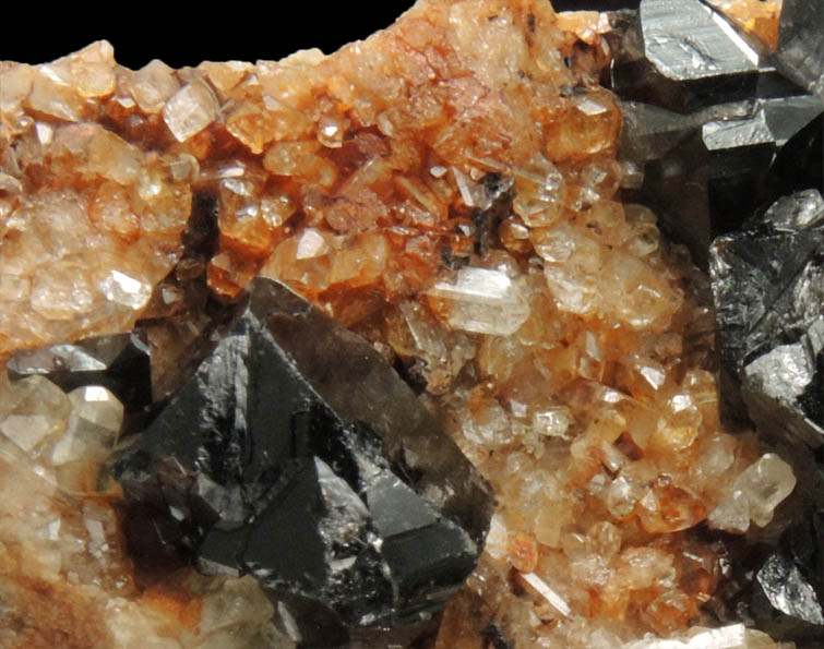 Cassiterite (twinned crystals) on Topaz from St. Agnes District, Cornwall, England
