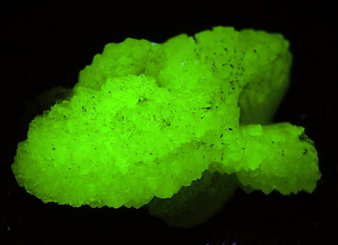 Photo below under longwave ultraviolet illumination of Adamite from Mina Ojuela, Mapimí, Durango, Mexico Adamite from Mina Ojuela, Mapimí, Durango, Mexico