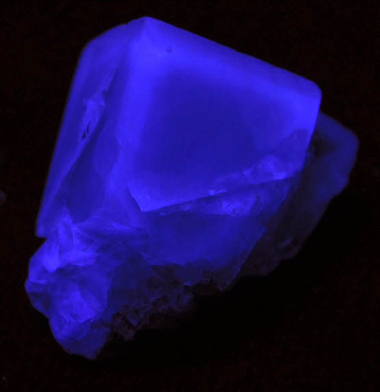 Photo below under shortwave ultraviolet illumination of Fluorite from Rogerley Mine, Frosterley, County Durham, England Fluorite from Rogerley Mine, Frosterley, County Durham, England