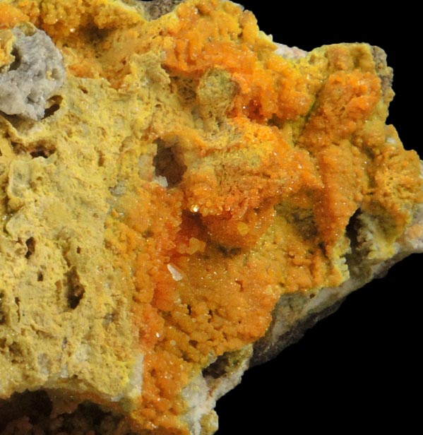 Pyromorphite (orange) with Cerussite and Mimetite(?) from Reids Vein, Leadhills, South Lanarkshire, Scotland