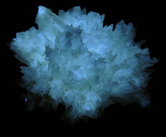 Photo below under longwave ultraviolet illumination of Calcite from Meckley's Quarry, 1.2 km south of Mandata, Northumberland County, Pennsylvania Calcite from Meckley's Quarry, 1.2 km south of Mandata, Northumberland County, Pennsylvania