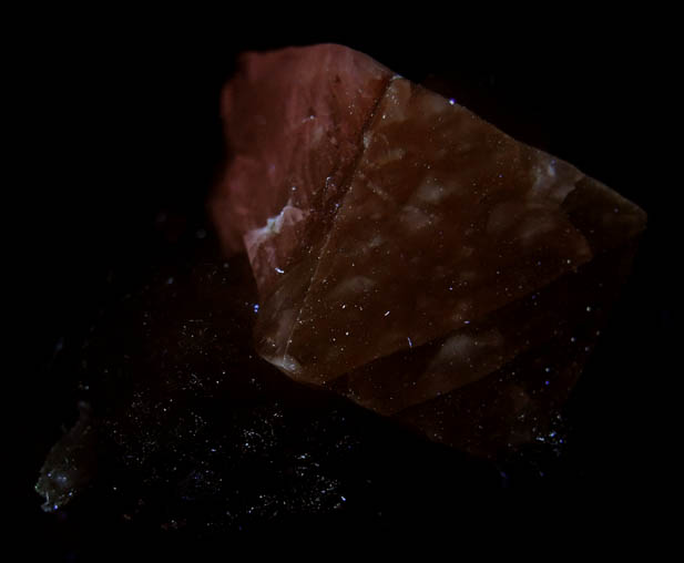 Photo below under longwave ultraviolet illumination of Calcite and Stilbite from Chimney Rock Quarry, Bound Brook, Somerset County, New Jersey Calcite and Stilbite from Chimney Rock Quarry, Bound Brook, Somerset County, New Jersey