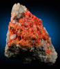Realgar with Calcite from Getchell Mine, Humboldt County, Nevada
