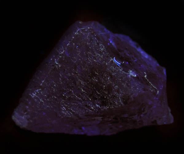 Photo below under shortwave ultraviolet illumination of Topaz from Agnus Dei Claim, Tribute Pocket, near Crystal Park, El Paso County, Colorado Topaz from Agnus Dei Claim, Tribute Pocket, near Crystal Park, El Paso County, Colorado