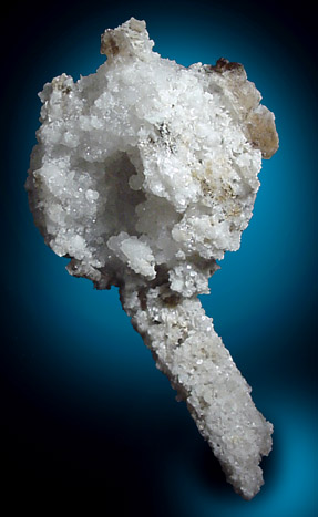 Analcime with fluorescent Quartz overgrowth from Mont Saint-Hilaire, Qubec, Canada