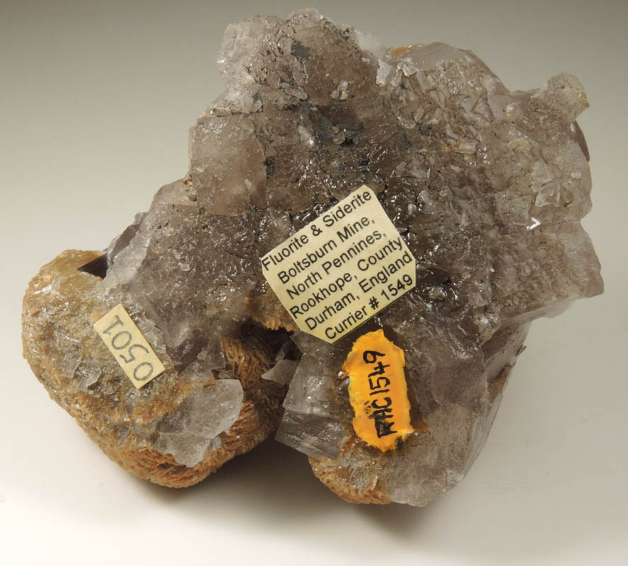 Fluorite (twinned crystals) with Siderite from Boltsburn Mine, Rookhope, County Durham, England