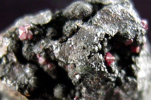 Cuprite on Psilomelane from Merehead Quarry, Shepton Mallet, Cranmore, England